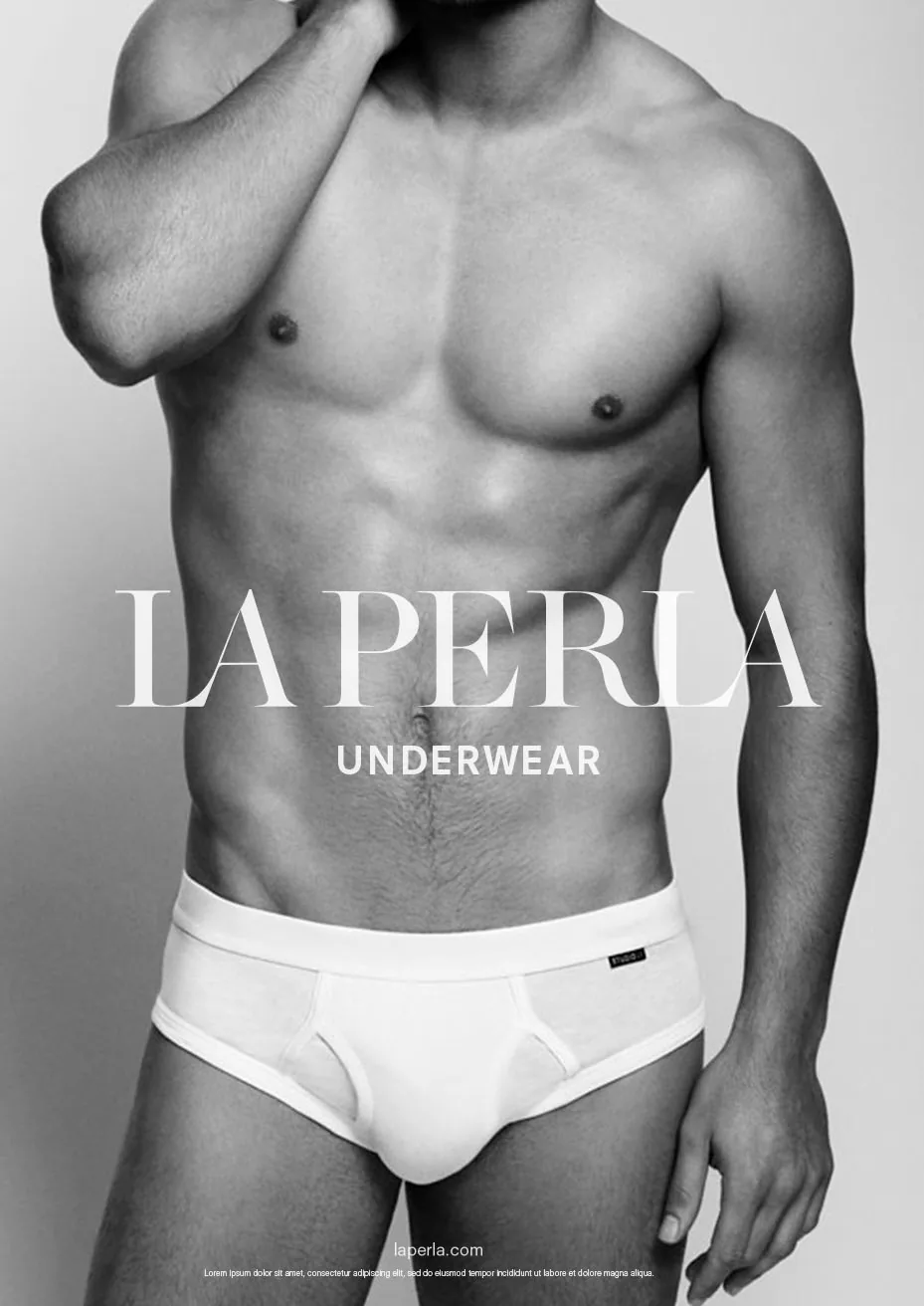 A black and white underwear campaign image, a man in white briefs with the La Perla Underwear wordmark set across the middle.